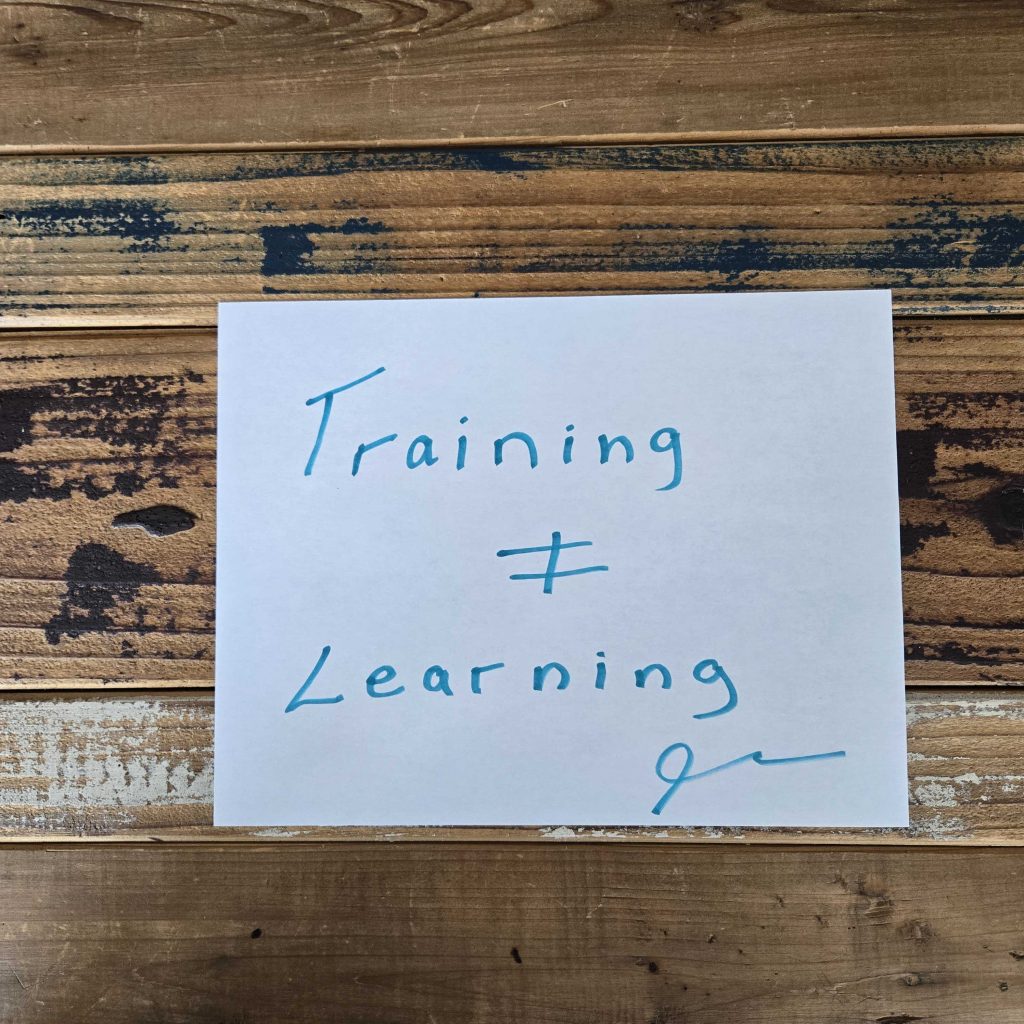 Visual illustrating the difference between training and learning in skills development